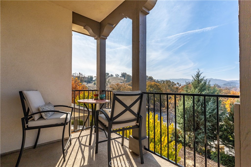 9354 Riberena Circle Atascadero, CA 93422 - Photo 42 of 47 a view of a balcony with chairs and wooden floor