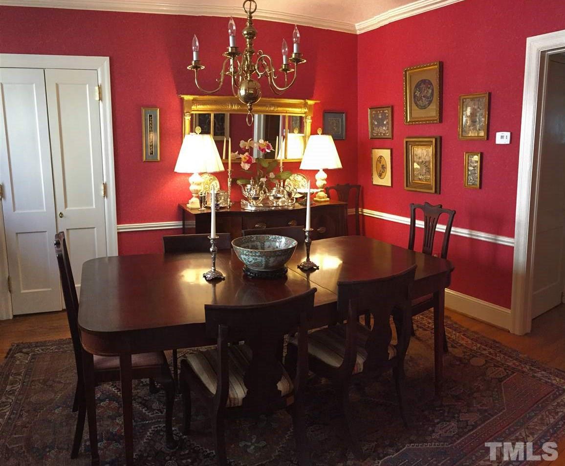 1418 Duplin Road Raleigh, NC 27607 - Photo 5 of 16 a view of a dining room with furniture and chandelier
