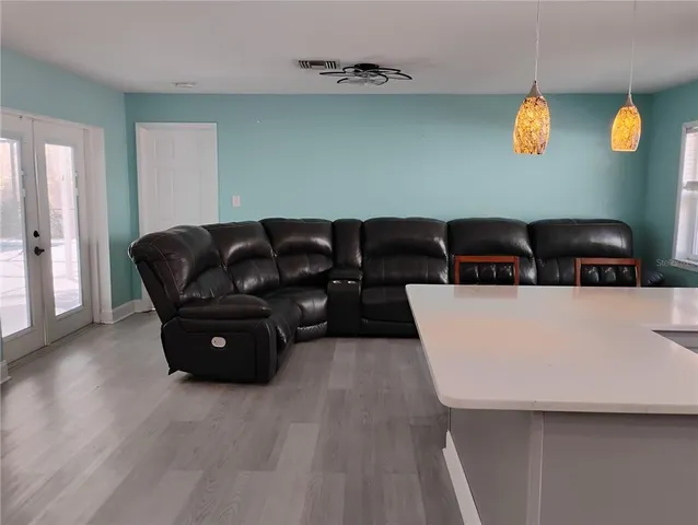 a view of an empty room with a window