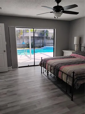 a bathroom with a shower and a toilet