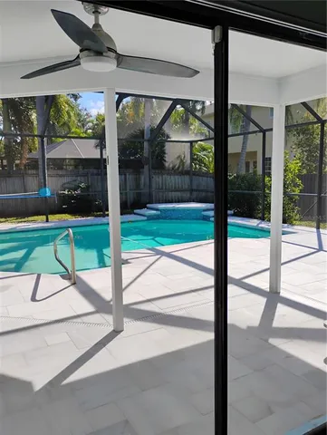 a bathroom with a bathtub and a sink