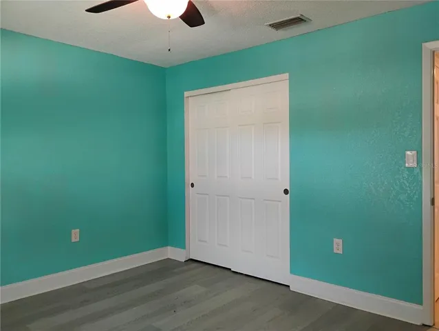 a room with a table and chairs