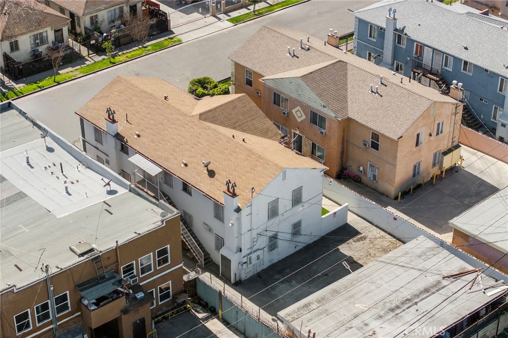 313 West Magnolia Street Compton, CA 90220 - Photo 8 of 11 view of a building with many windows