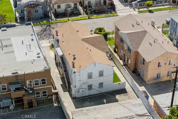 an aerial view of a house with a garden