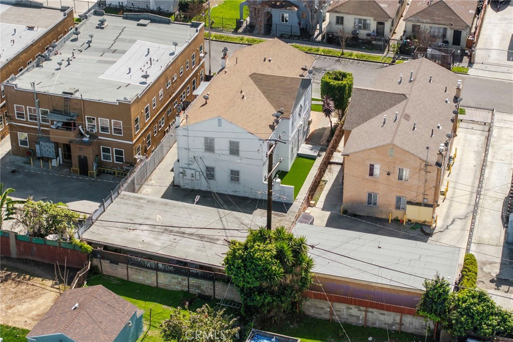 313 West Magnolia Street Compton, CA 90220 - Photo 10 of 11 an aerial view of a house with a garden