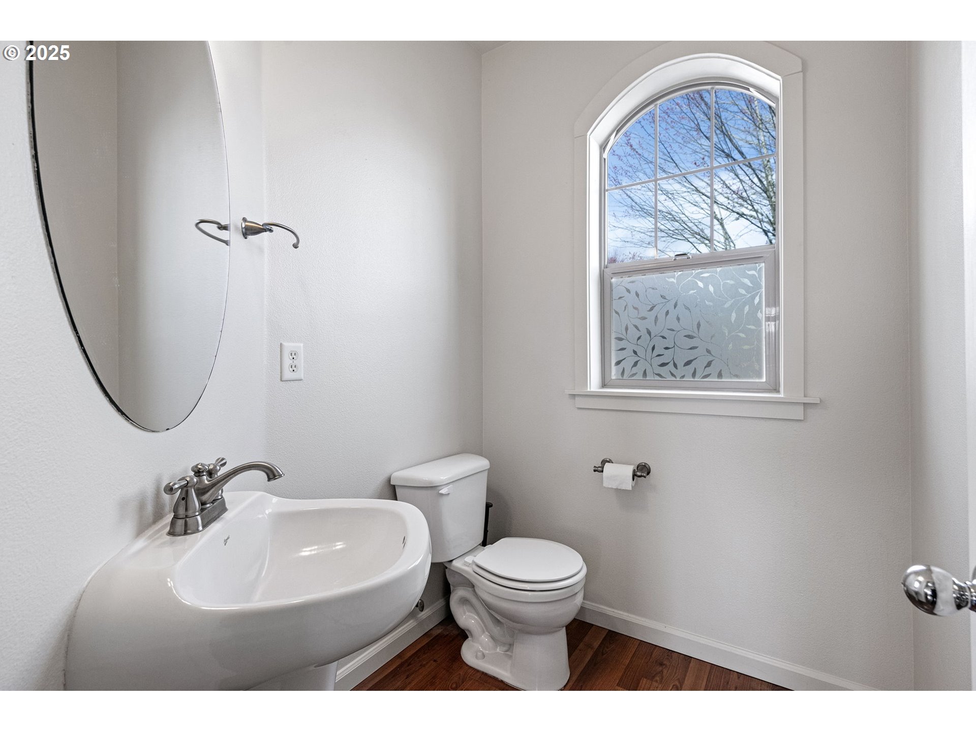 5462 Pranz Place Eugene, OR 97402 - Photo 19 of 43 a bathroom with a toilet a sink and mirror