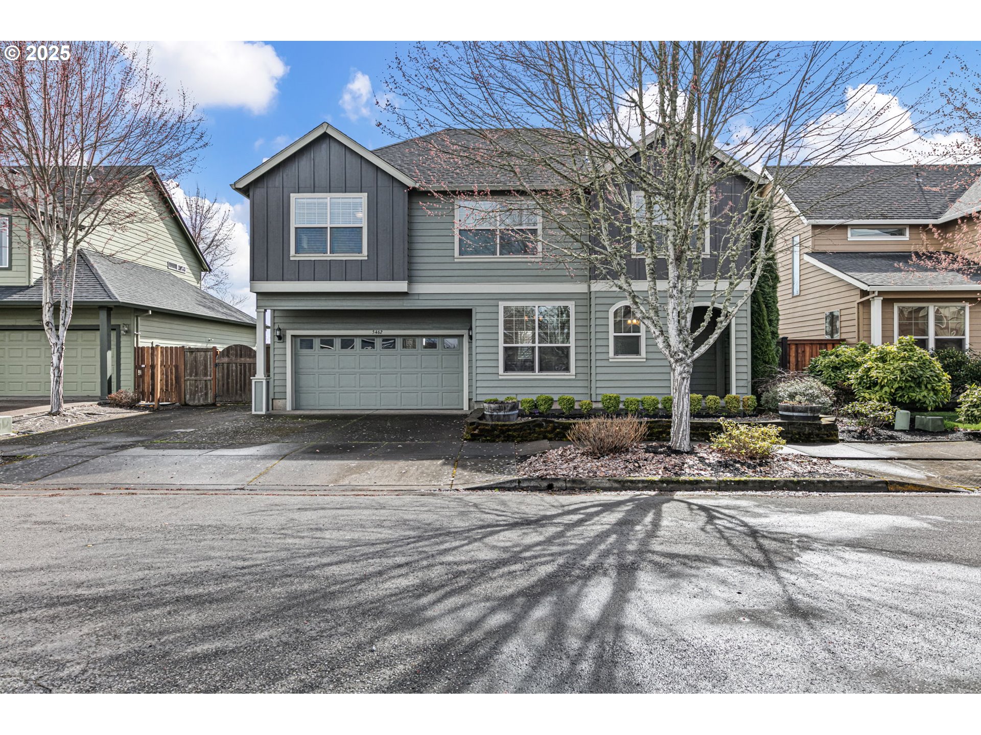5462 Pranz Place Eugene, OR 97402 - Photo 2 of 43 a front view of a house with a garden