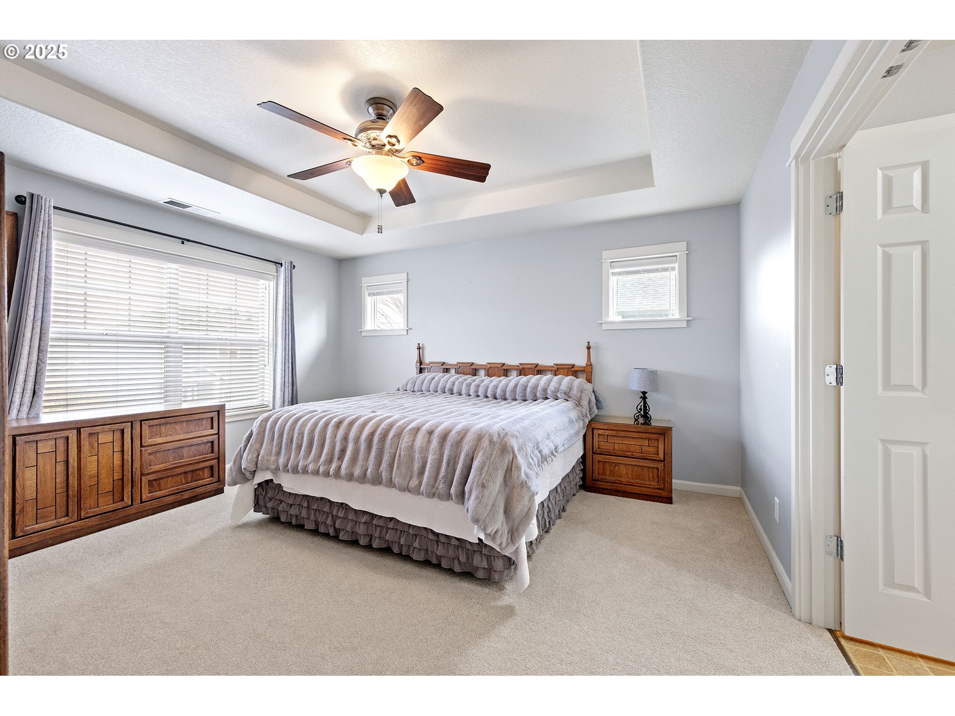 5462 Pranz Place Eugene, OR 97402 - Photo 23 of 43 a spacious bedroom with a bed and window
