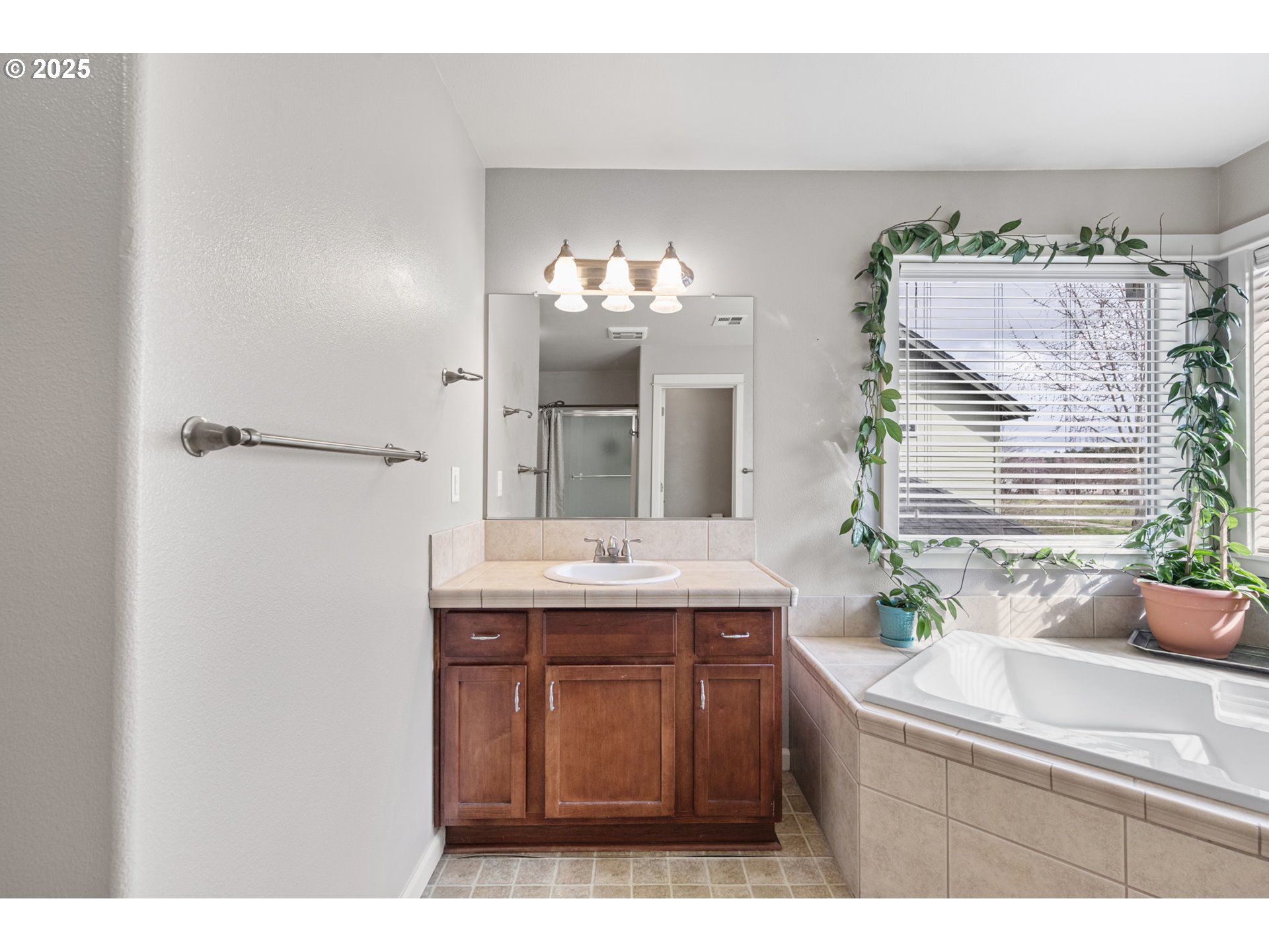 5462 Pranz Place Eugene, OR 97402 - Photo 25 of 43 a bathroom with a sink and a mirror