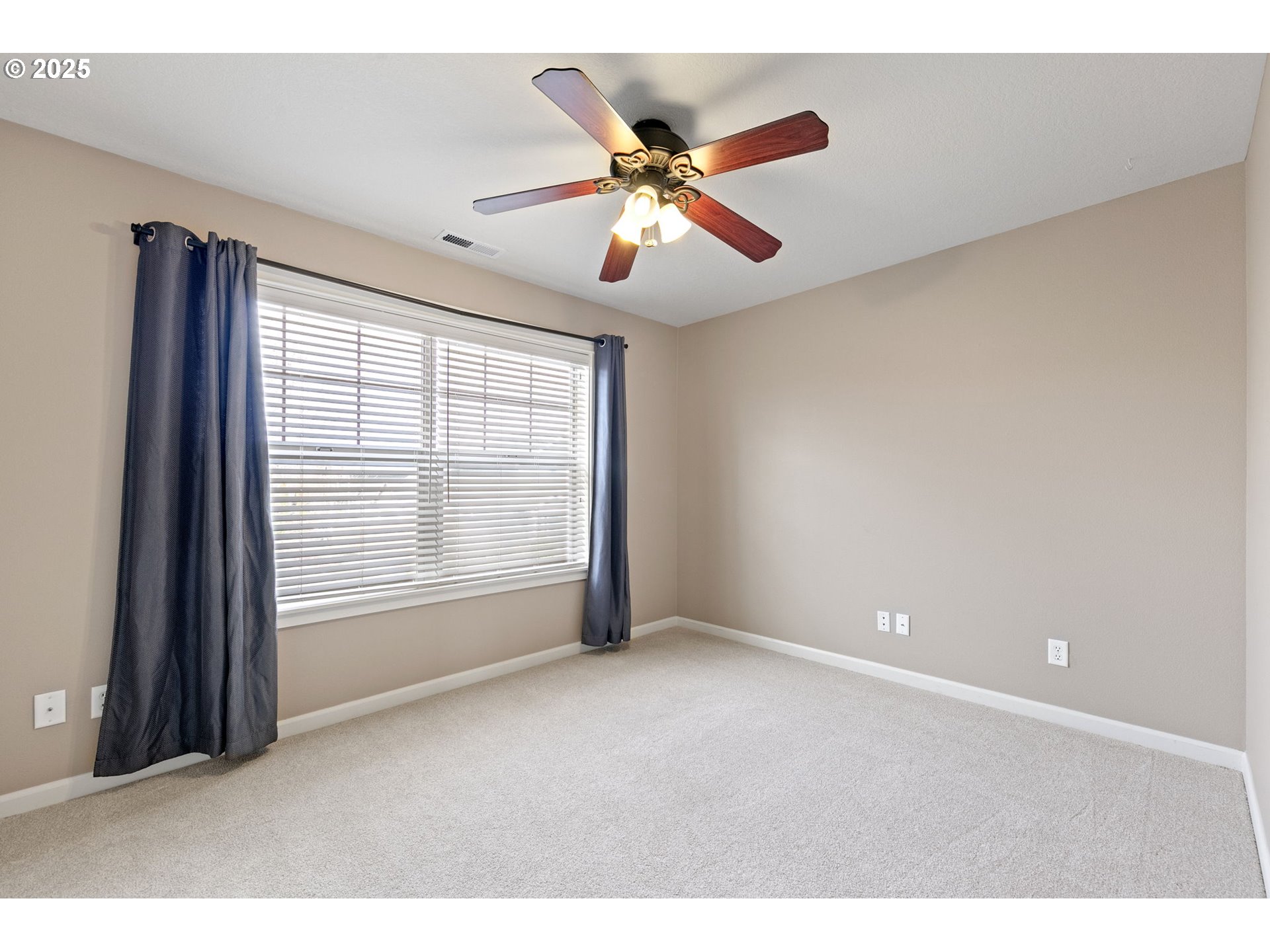 5462 Pranz Place Eugene, OR 97402 - Photo 30 of 43 a view of an empty room with a window
