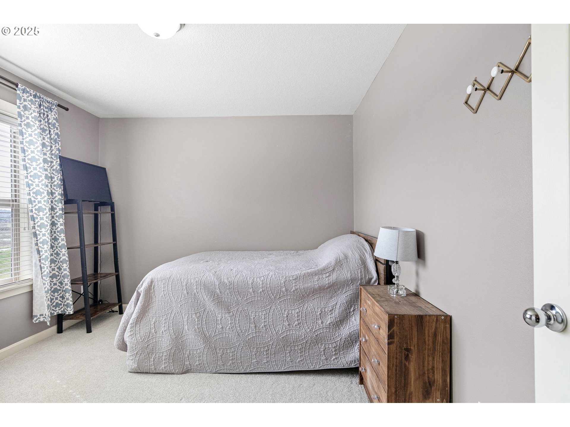 5462 Pranz Place Eugene, OR 97402 - Photo 32 of 43 a bedroom with a bed and a window