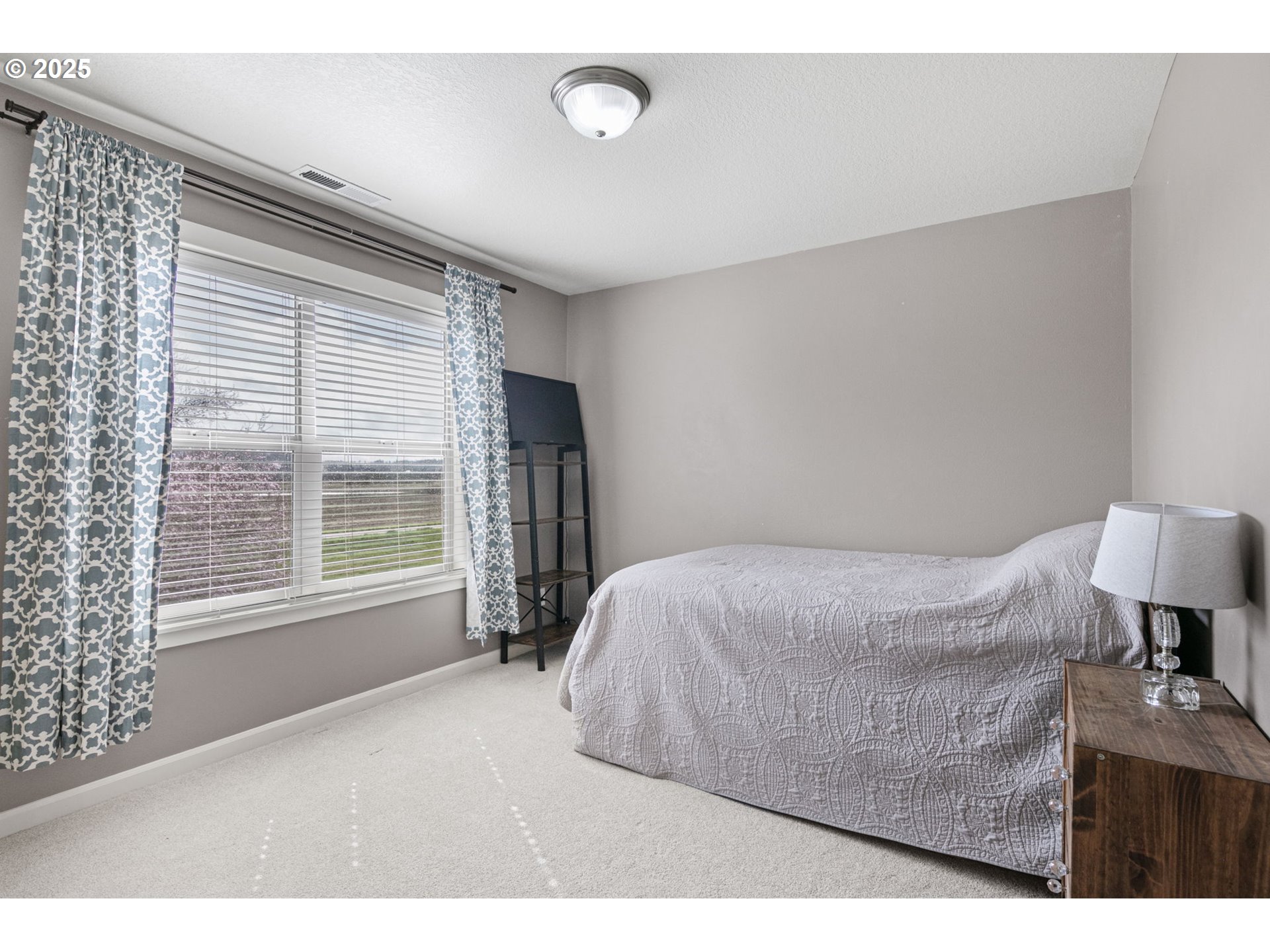 5462 Pranz Place Eugene, OR 97402 - Photo 33 of 43 a bedroom with a bed and a window