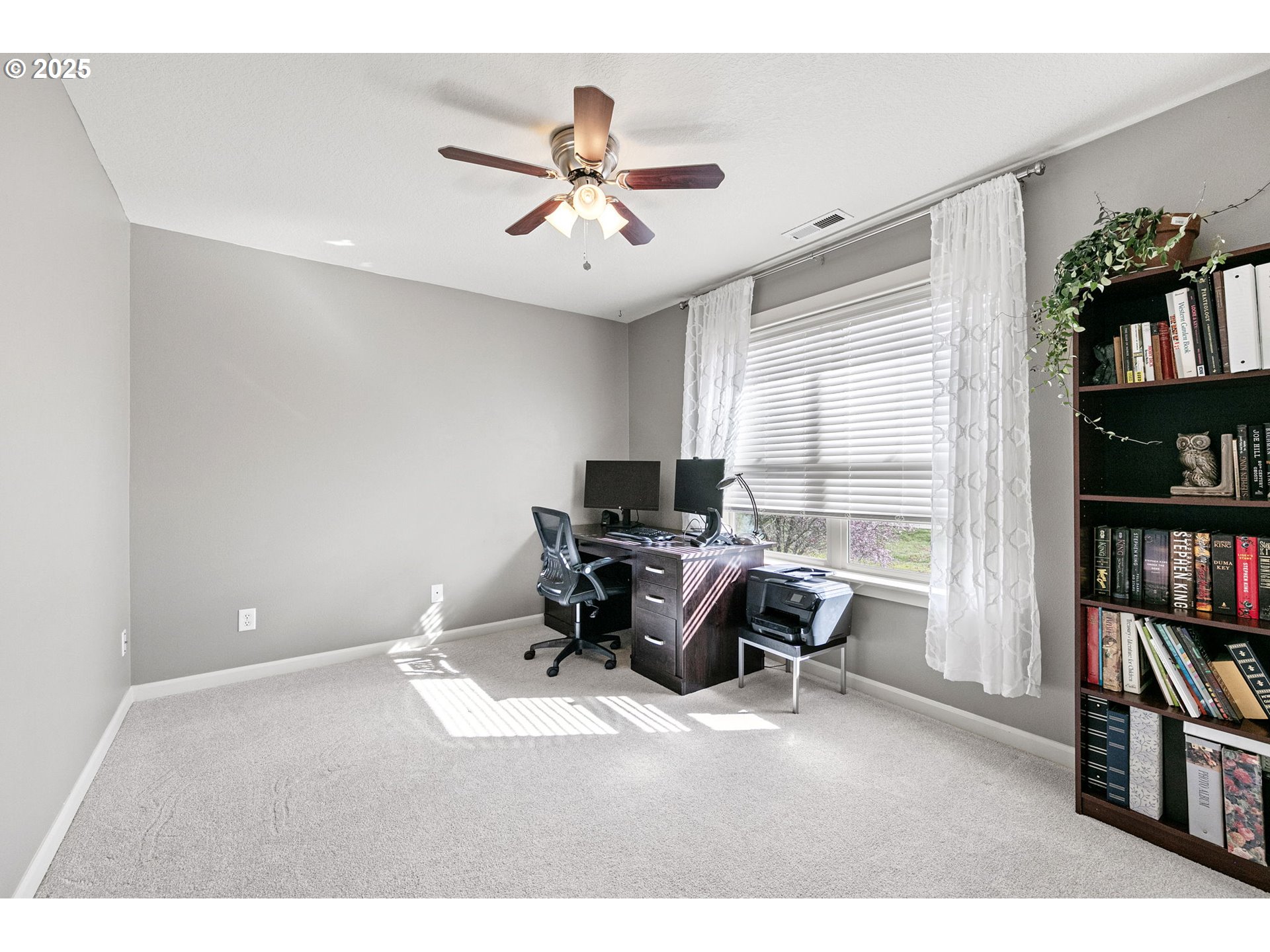 5462 Pranz Place Eugene, OR 97402 - Photo 34 of 43 a workspace with a bookshelf