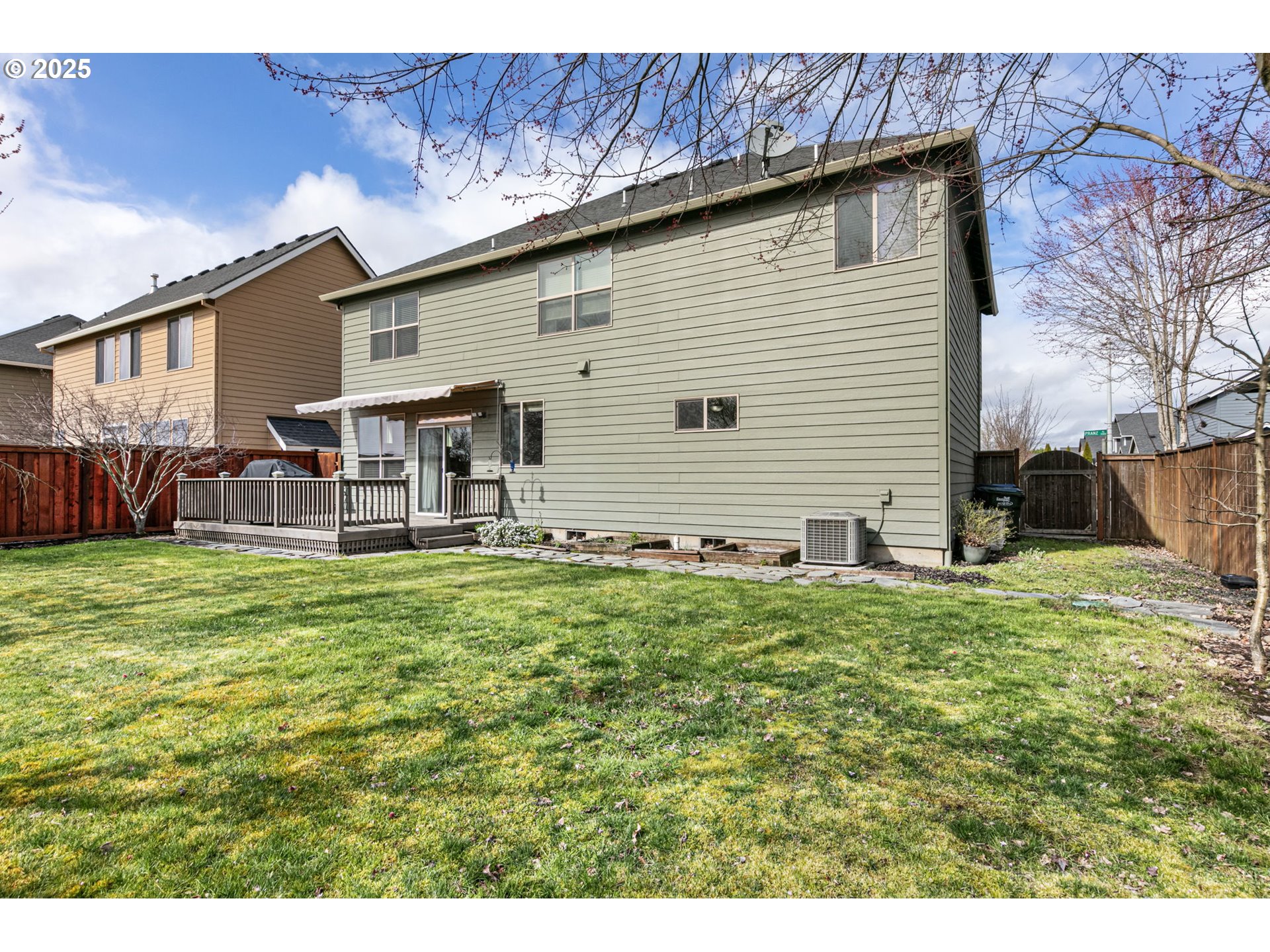 5462 Pranz Place Eugene, OR 97402 - Photo 37 of 43 a backyard of a house with table and chairs