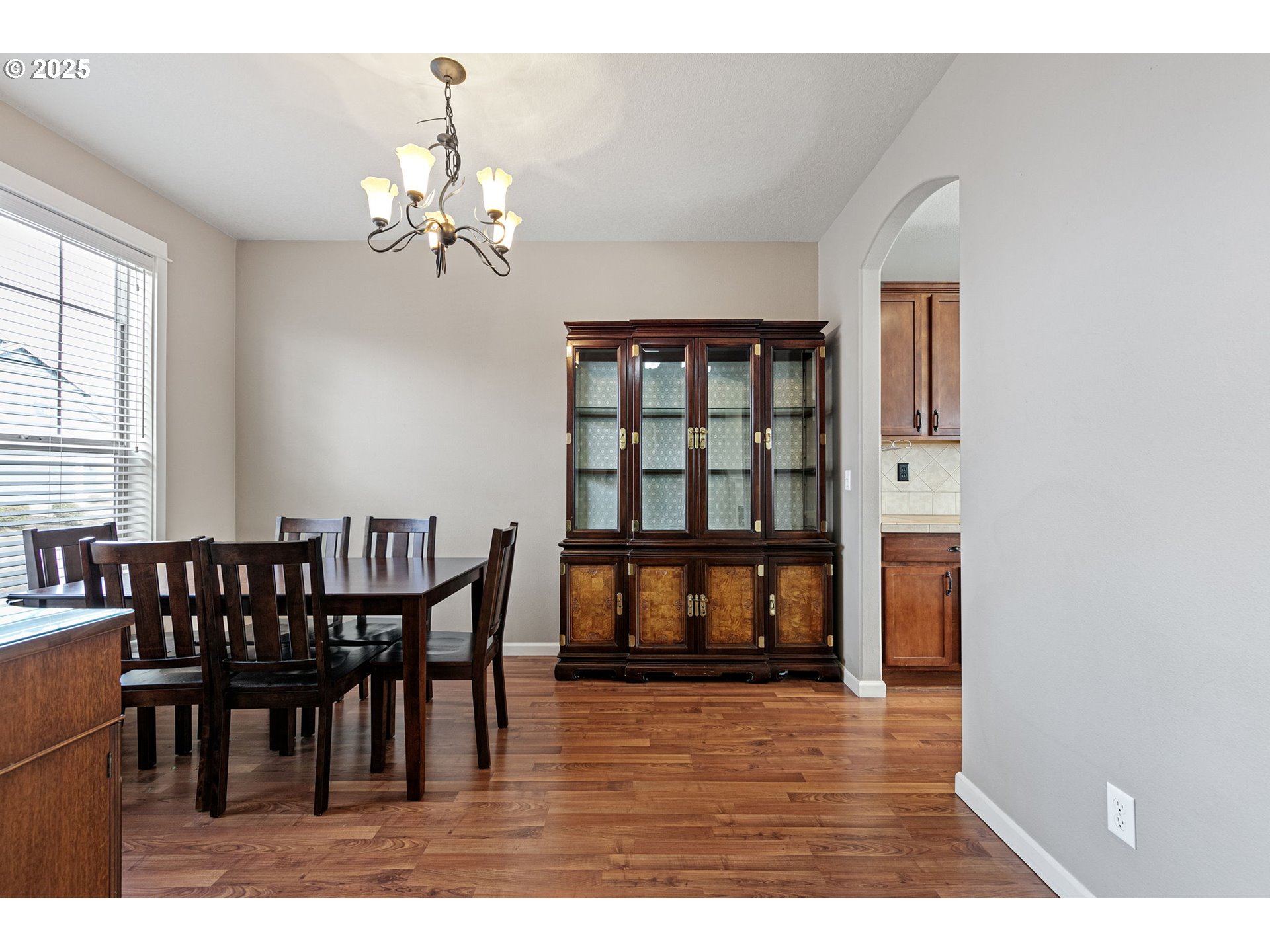 5462 Pranz Place Eugene, OR 97402 - Photo 10 of 43 a view of a dining room with furniture and chandelier