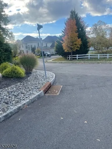a view of a yard with a tree