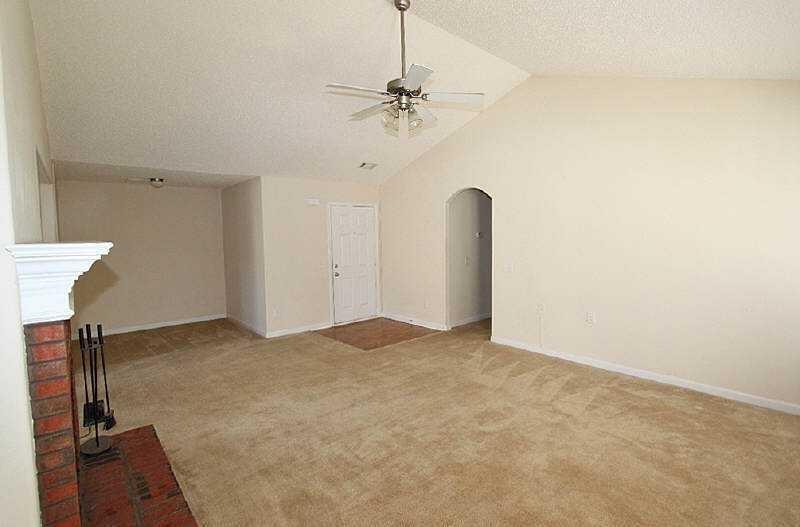 210 Joe Graham Road Hull, GA 30646 - Photo 13 of 21 a view of a room with a chandelier