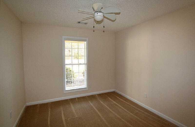 210 Joe Graham Road Hull, GA 30646 - Photo 14 of 21 a view of an empty room with a window