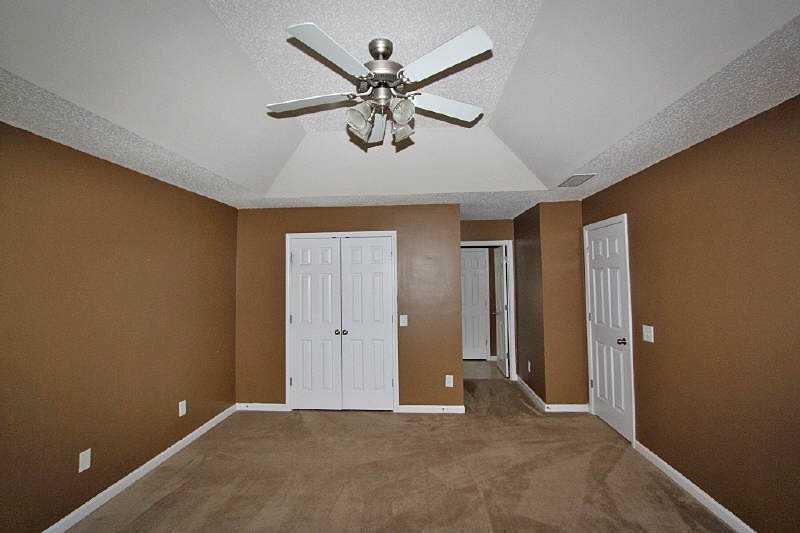 210 Joe Graham Road Hull, GA 30646 - Photo 17 of 21 an empty room with closet and ceiling fan