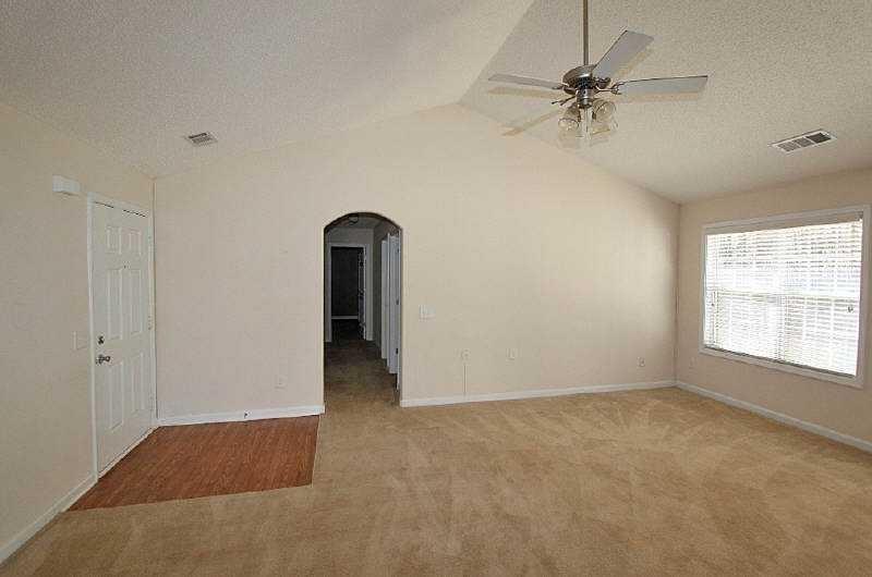 210 Joe Graham Road Hull, GA 30646 - Photo 7 of 21 wooden floor in an empty room with a window