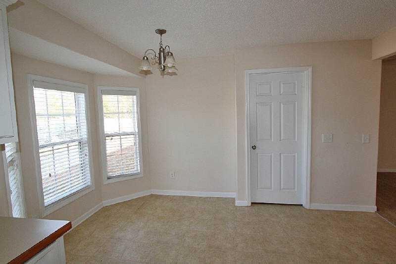 210 Joe Graham Road Hull, GA 30646 - Photo 8 of 21 a view of an empty room with a window