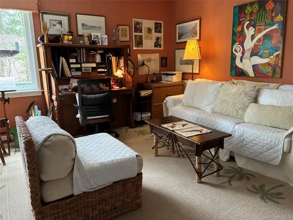 a bathroom with a shower sink and mirror