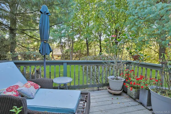 a backyard of a house with lots of green space and trees