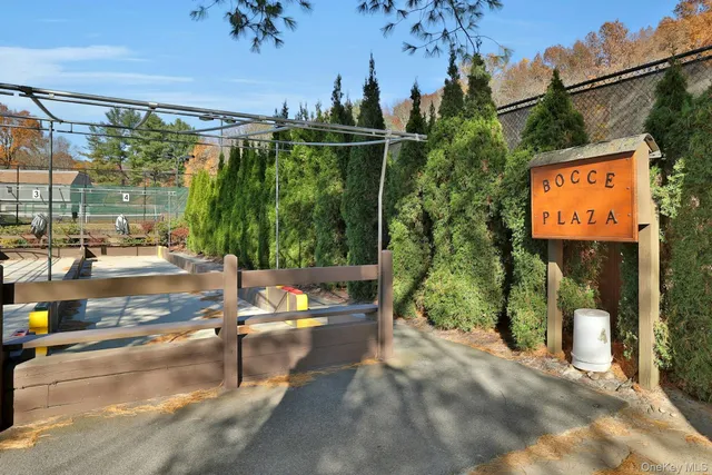 a view of a street with sitting area