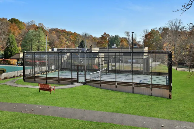 a park with wooden fence