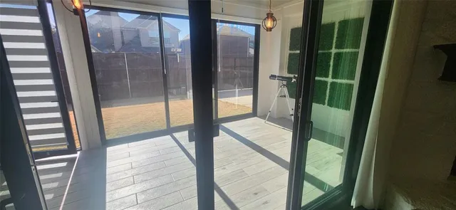 a bathroom with a glass door