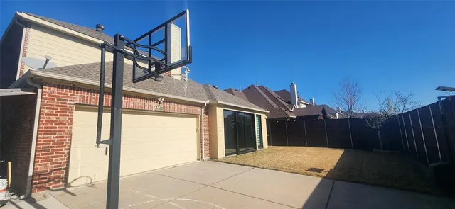 a view of a wooden fence