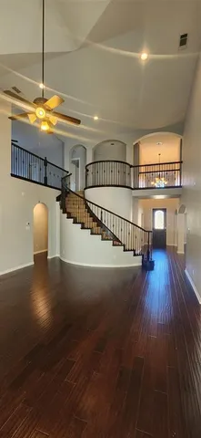 a view of a livingroom with furniture and wooden floor