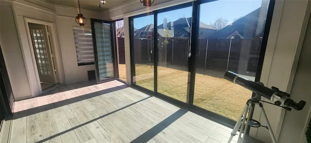 a view of a living room with a large window