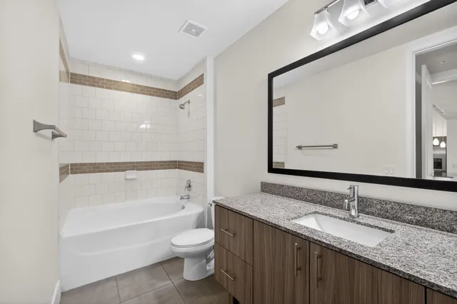 a view of a hallway with washer and dryer