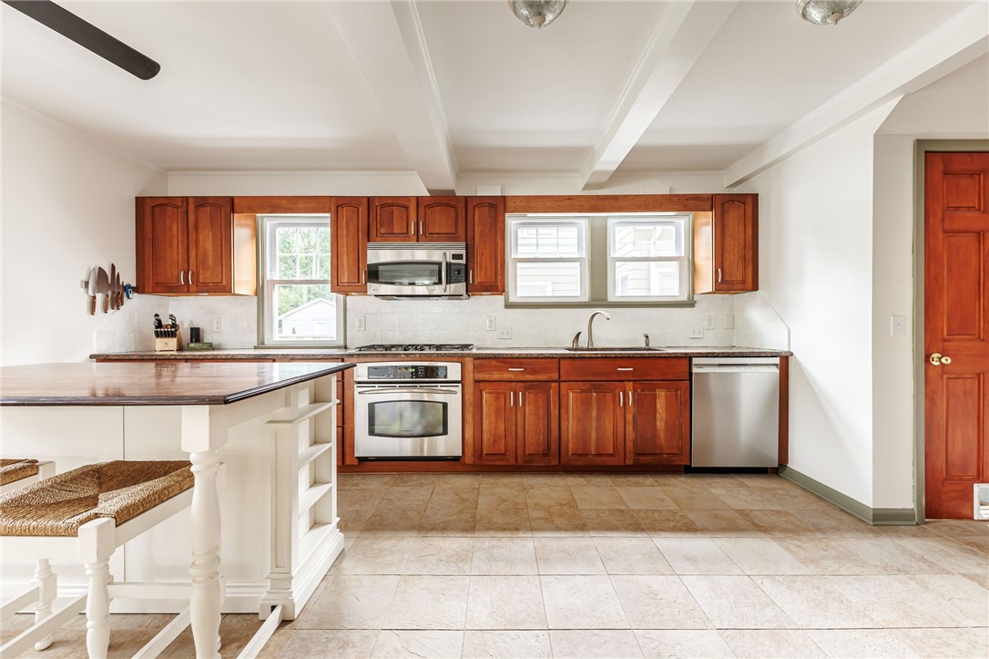 55 Elm Drive Rochester, NY 14609 - Photo 10 of 31 All stainless steel appliances remain
