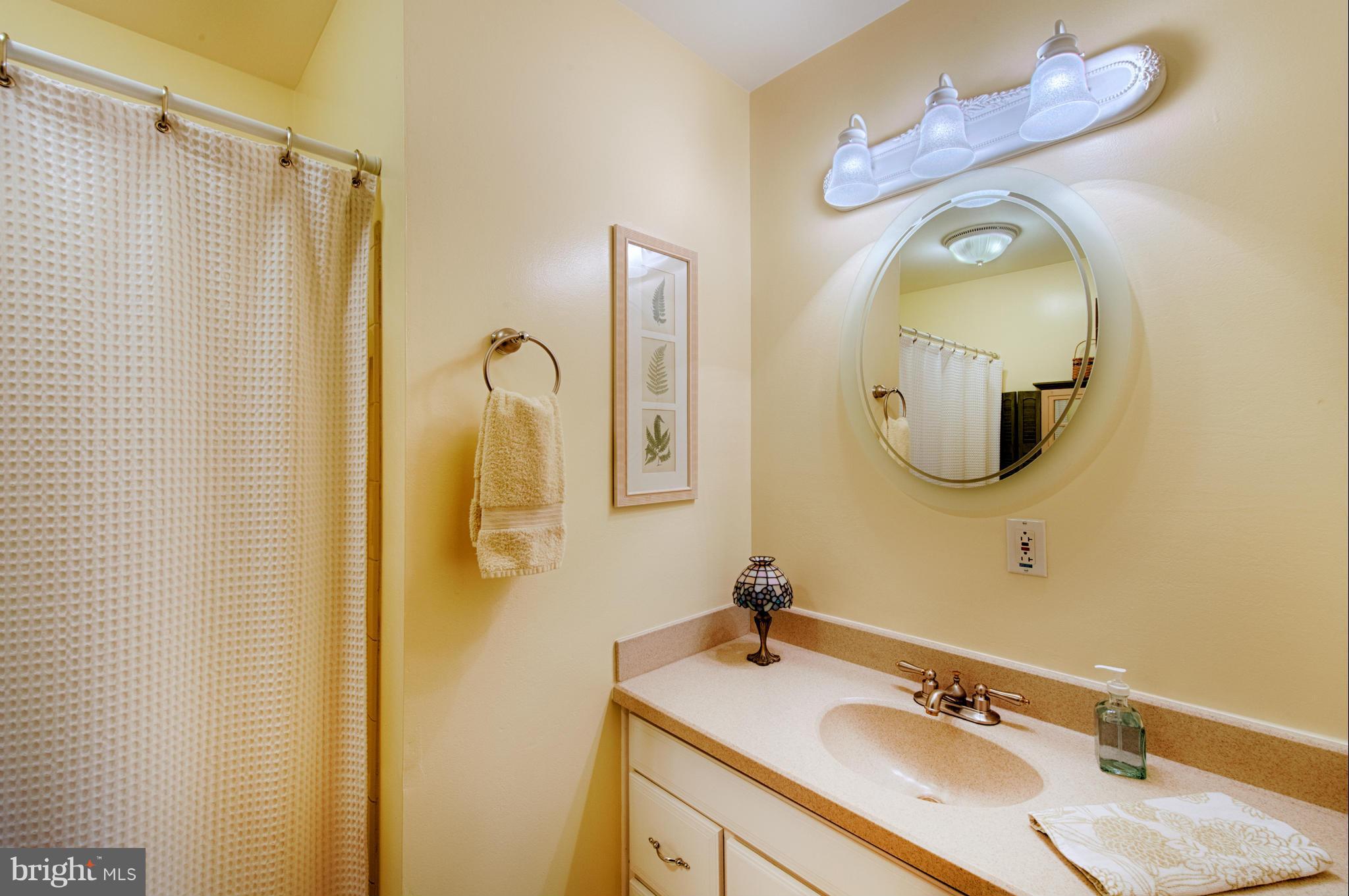 536 Stratford Road Fallston, MD 21047 - Photo 11 of 30 a bathroom with a granite countertop sink mirror and vanity