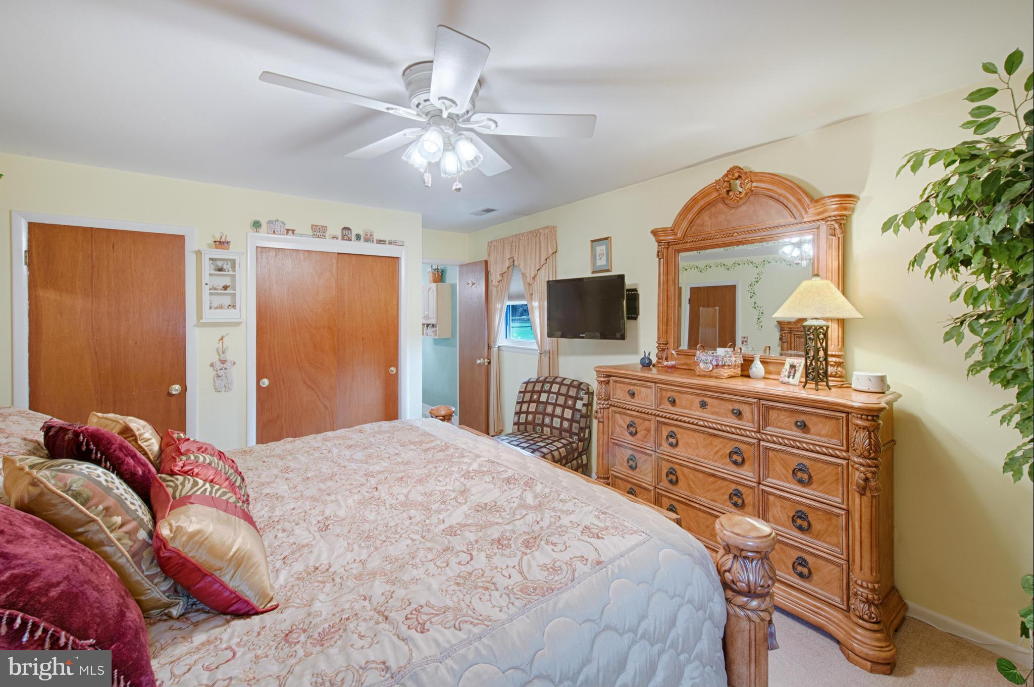 536 Stratford Road Fallston, MD 21047 - Photo 15 of 30 a bedroom with a bed and a flat screen tv