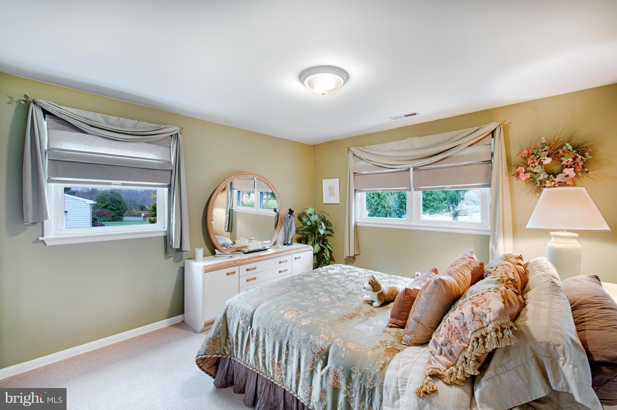 536 Stratford Road Fallston, MD 21047 - Photo 17 of 30 a bed sitting in a bedroom next to a window