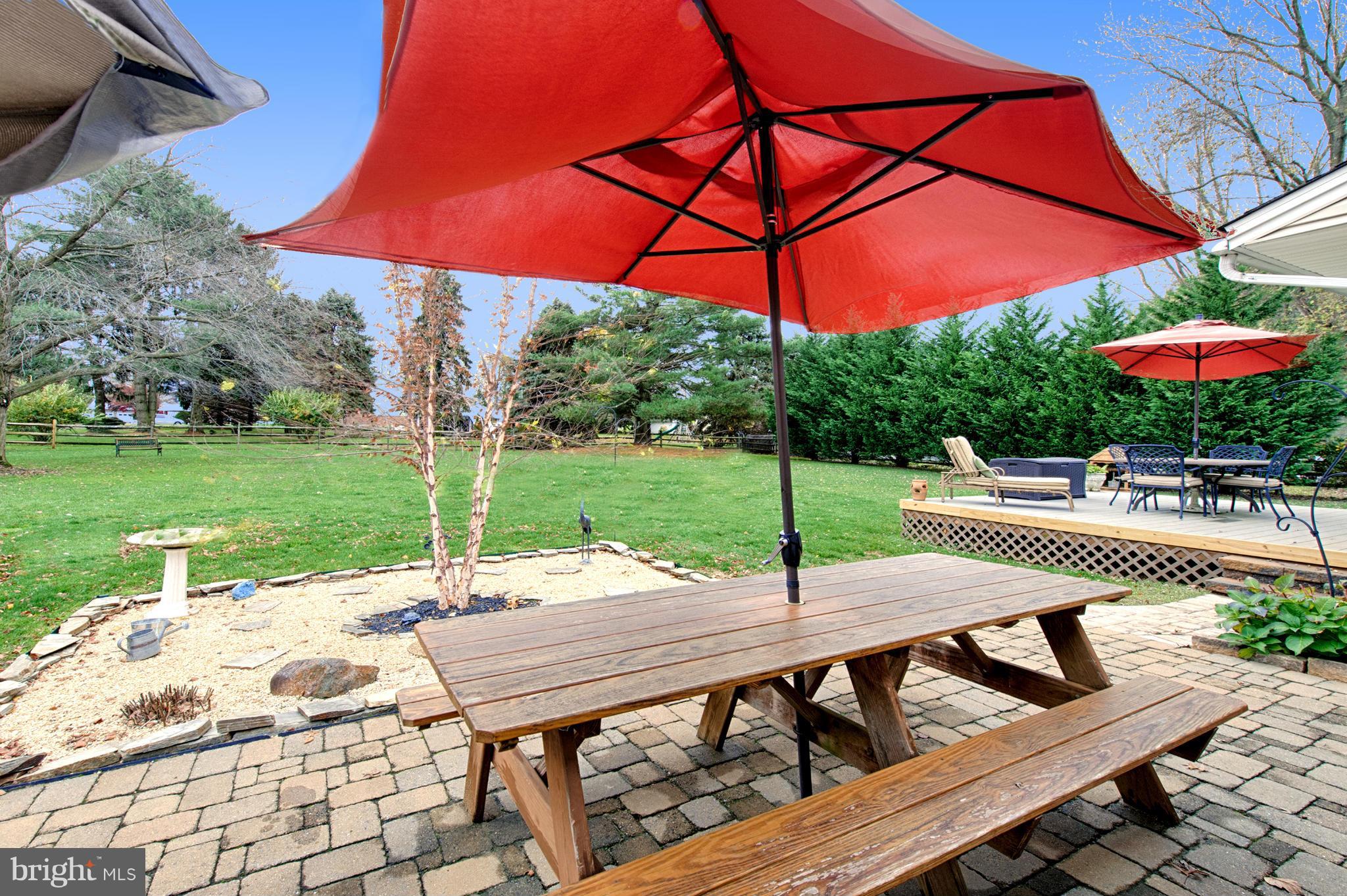 536 Stratford Road Fallston, MD 21047 - Photo 27 of 30 a view of a patio with a table and chairs under an umbrella