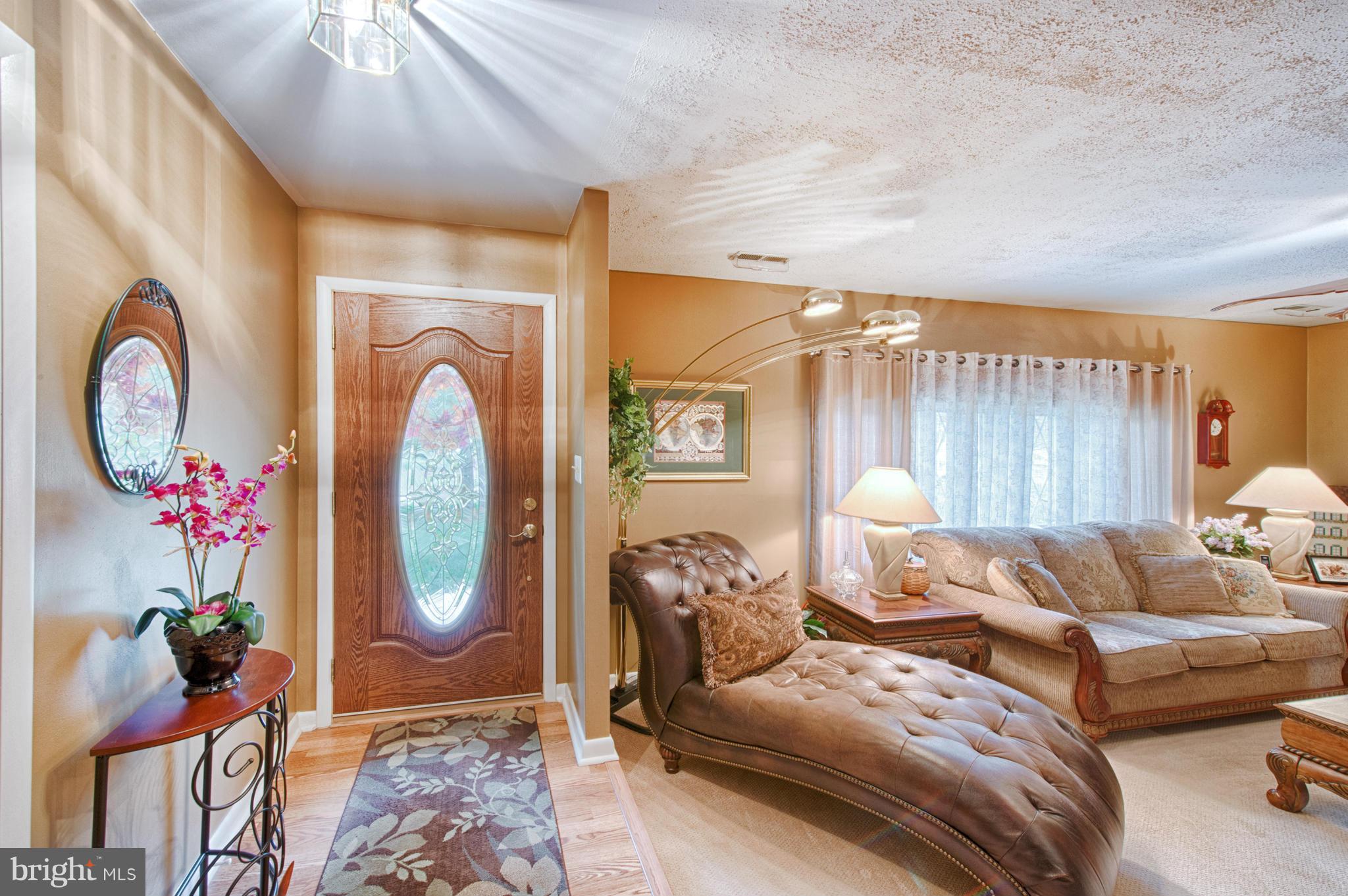 536 Stratford Road Fallston, MD 21047 - Photo 4 of 30 a living room with furniture a potted plant and a large window