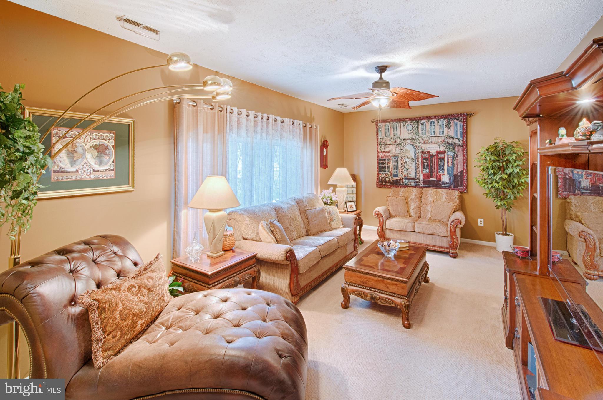 536 Stratford Road Fallston, MD 21047 - Photo 5 of 30 a living room with furniture and a chandelier