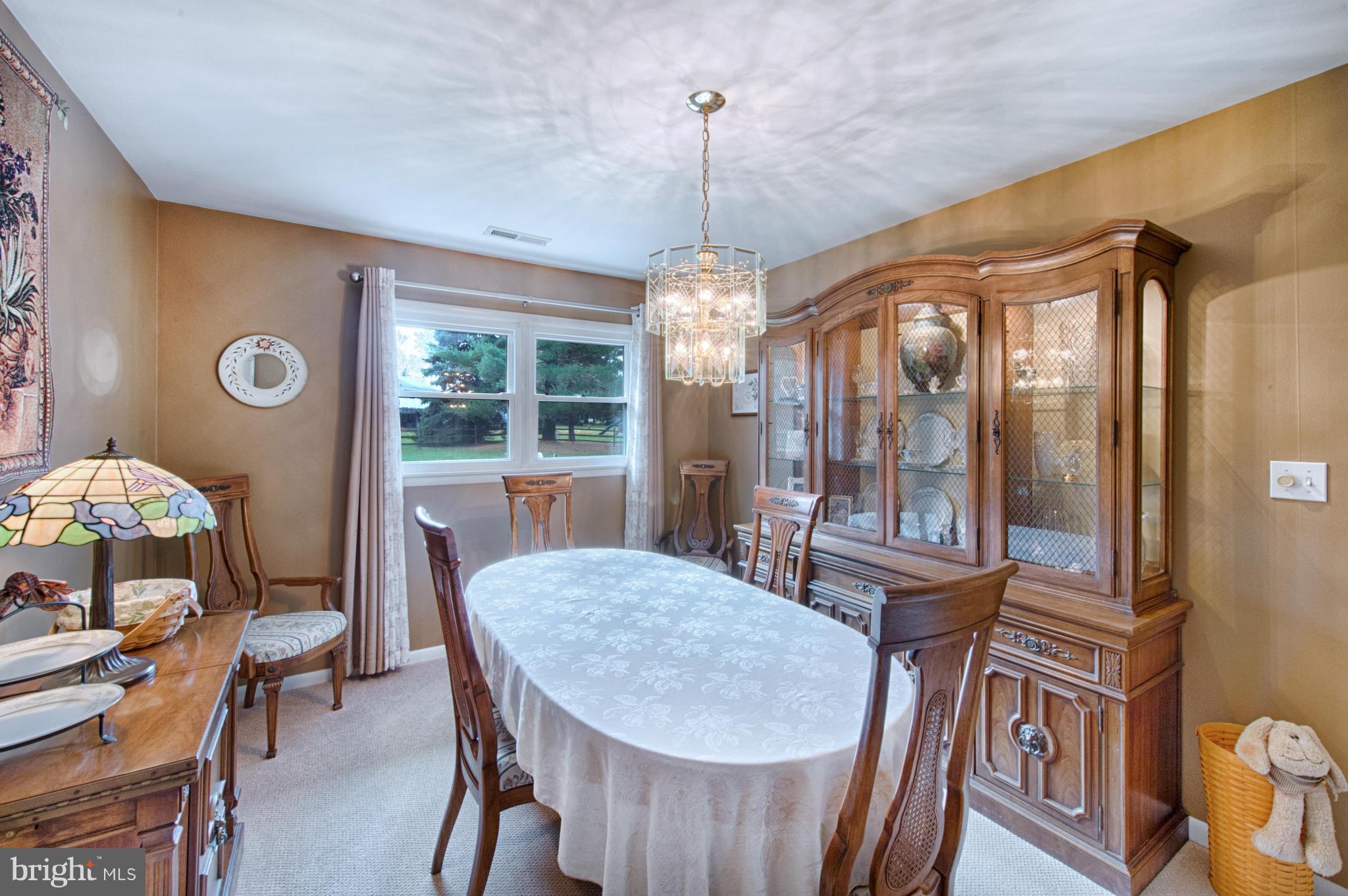 536 Stratford Road Fallston, MD 21047 - Photo 7 of 30 a dining room with furniture a chandelier and window