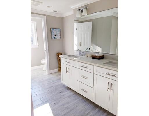 64 Bristol Road Wellesley, MA 02481 - Photo 20 of 28 a bathroom with a granite countertop sink and a mirror