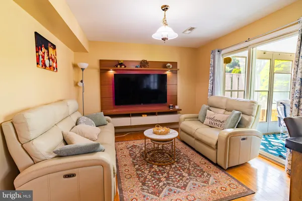 a living room with furniture and a table