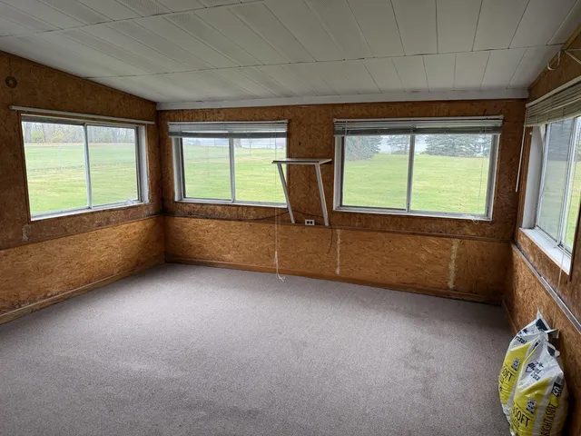 a view of a back yard of the house