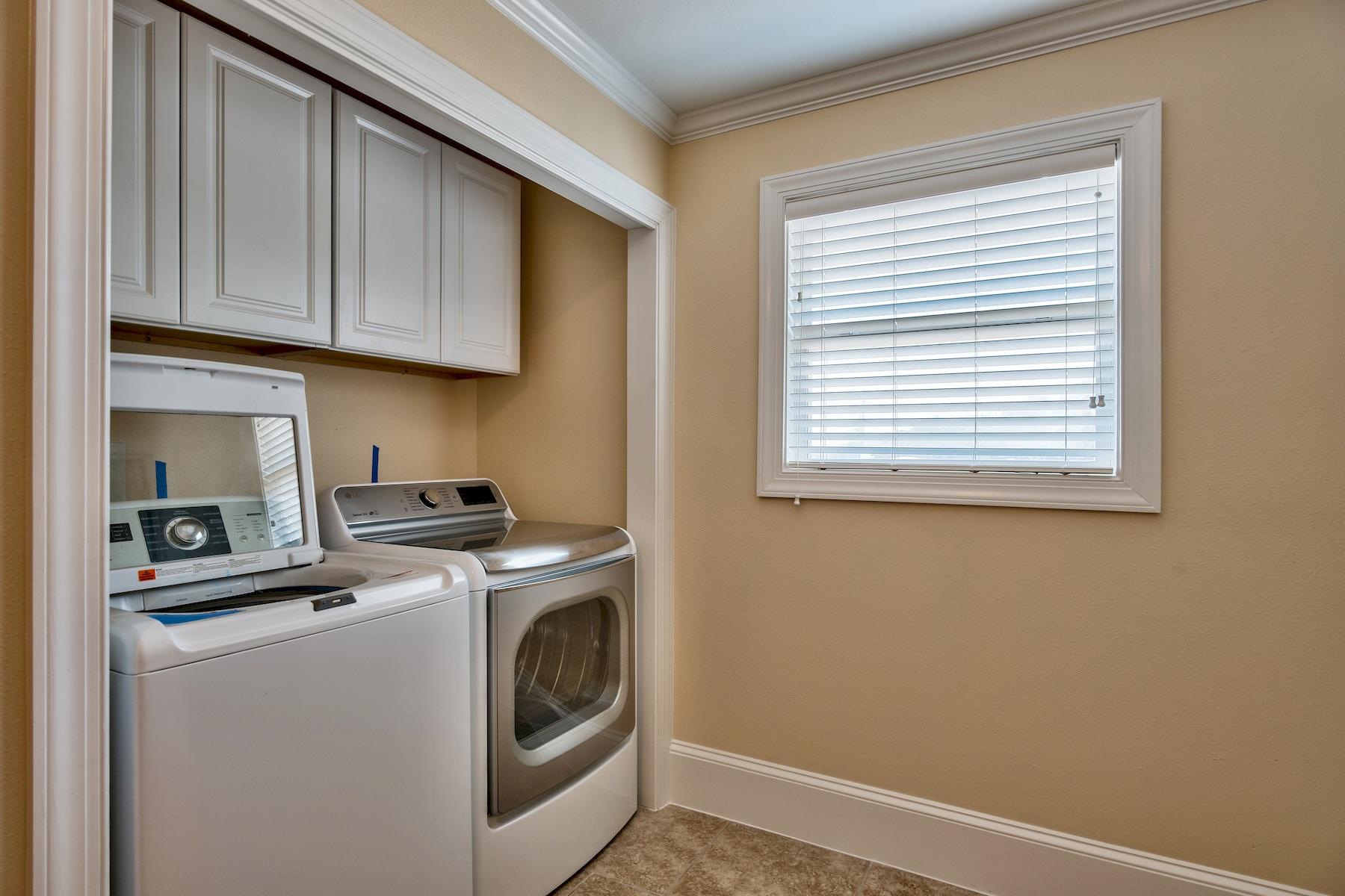 601 Blue Mountain Road Santa Rosa Beach, FL 32459 - Photo 16 of 51 a utility room with dryer and washer