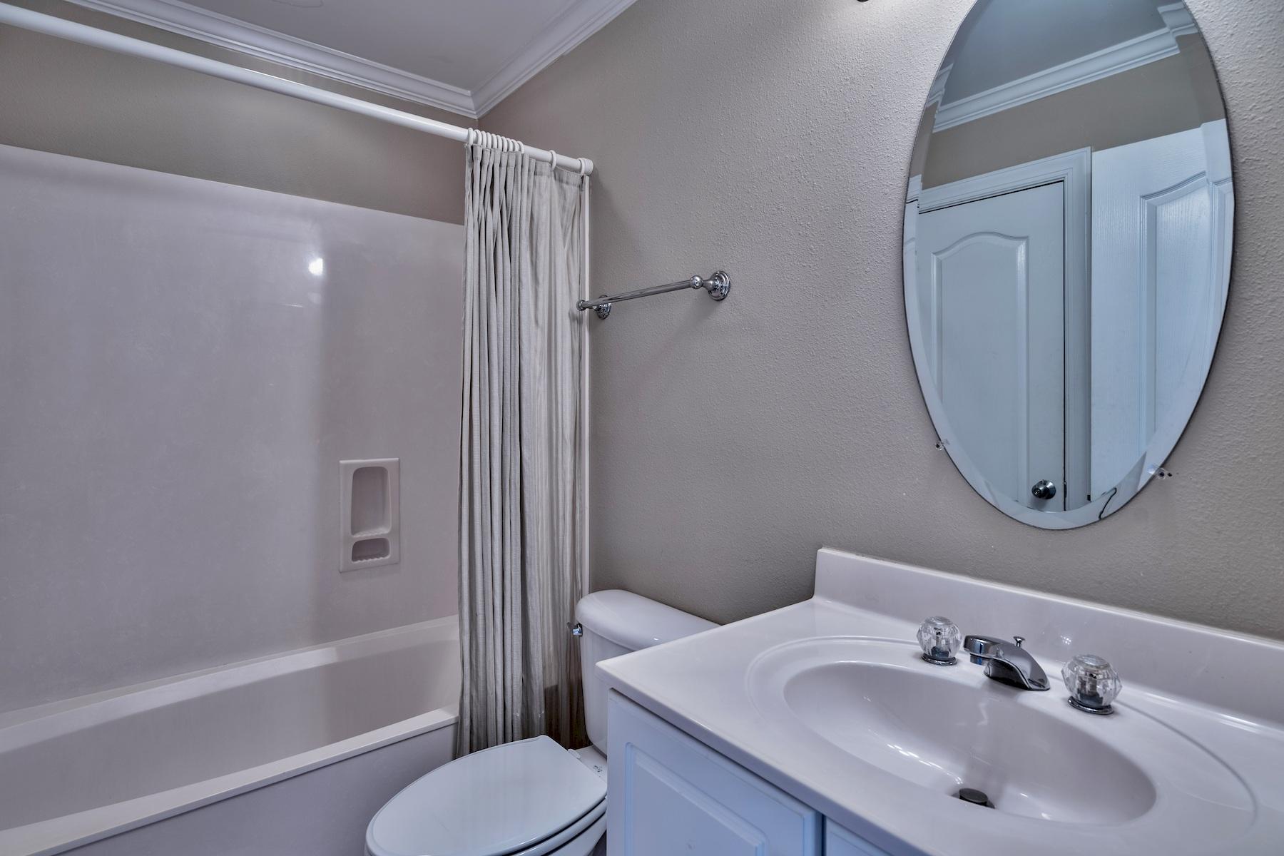 601 Blue Mountain Road Santa Rosa Beach, FL 32459 - Photo 19 of 51 a bathroom with a sink toilet and shower