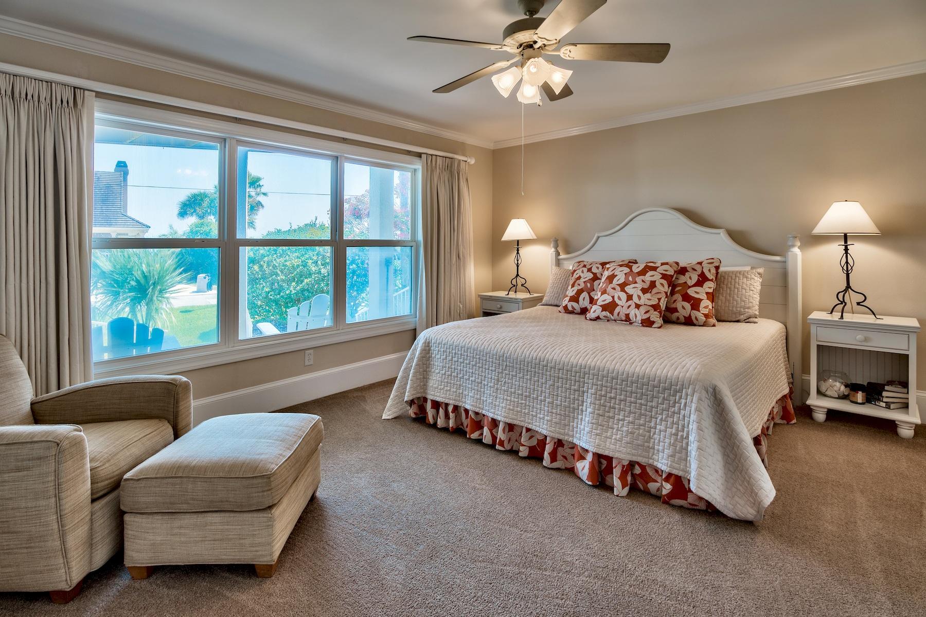 601 Blue Mountain Road Santa Rosa Beach, FL 32459 - Photo 23 of 51 a bedroom with a bed couch and window