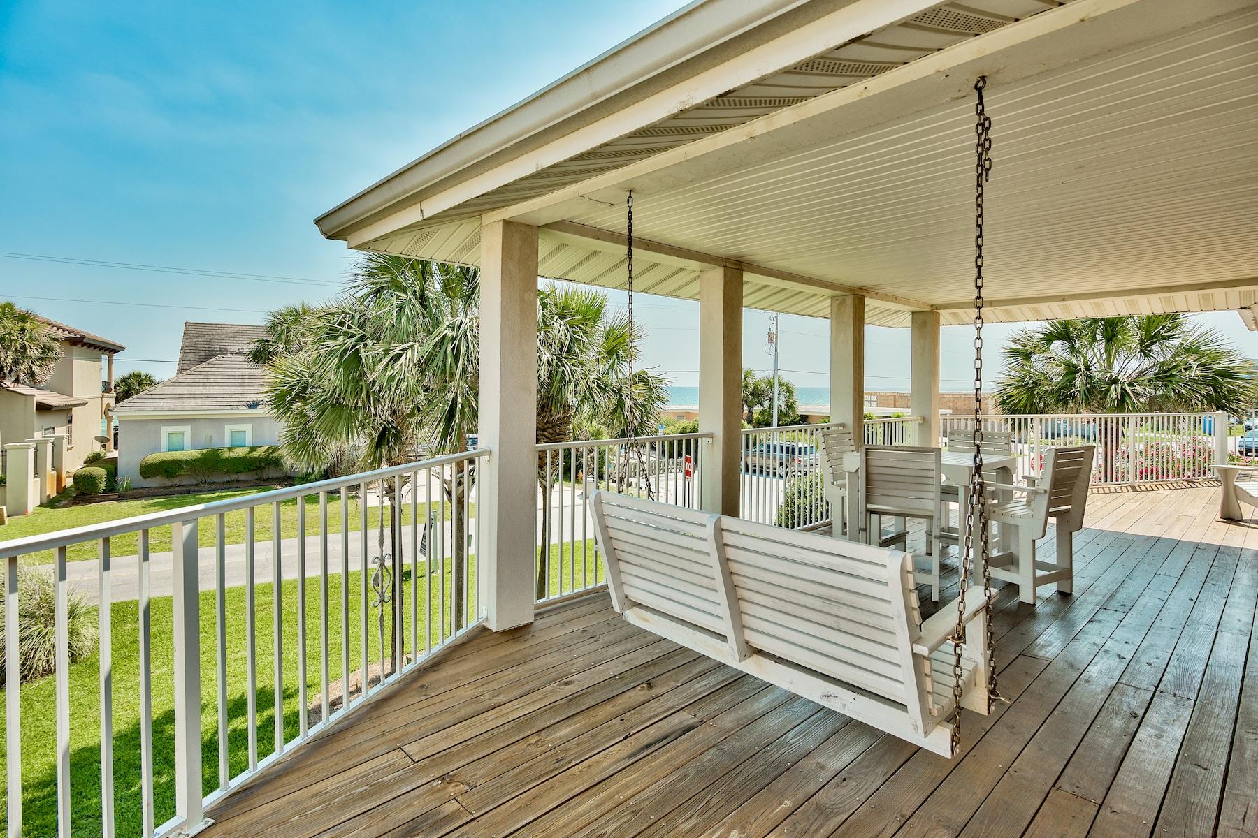 601 Blue Mountain Road Santa Rosa Beach, FL 32459 - Photo 30 of 51 a view of balcony with floor to ceiling window wooden floor