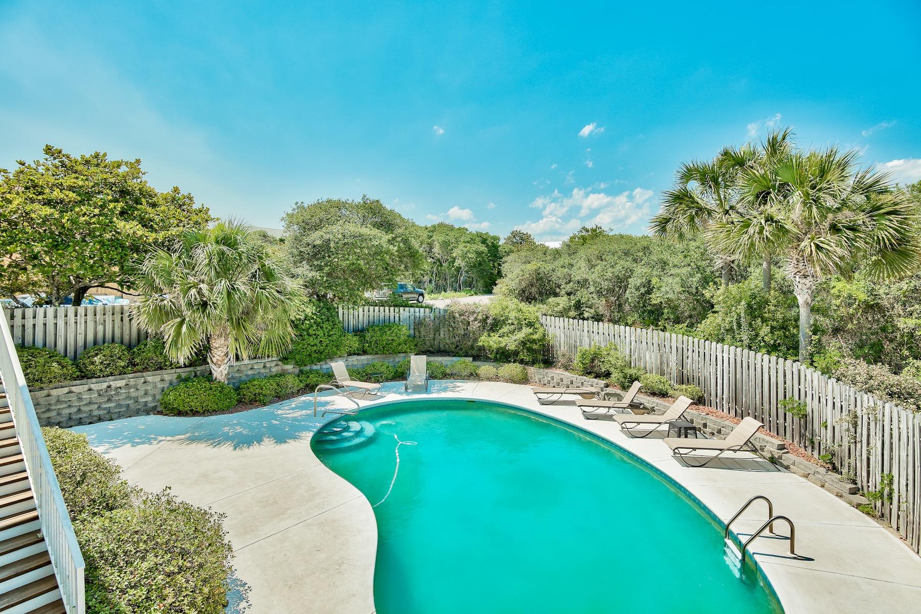 601 Blue Mountain Road Santa Rosa Beach, FL 32459 - Photo 31 of 51 a view of a swimming pool with a patio